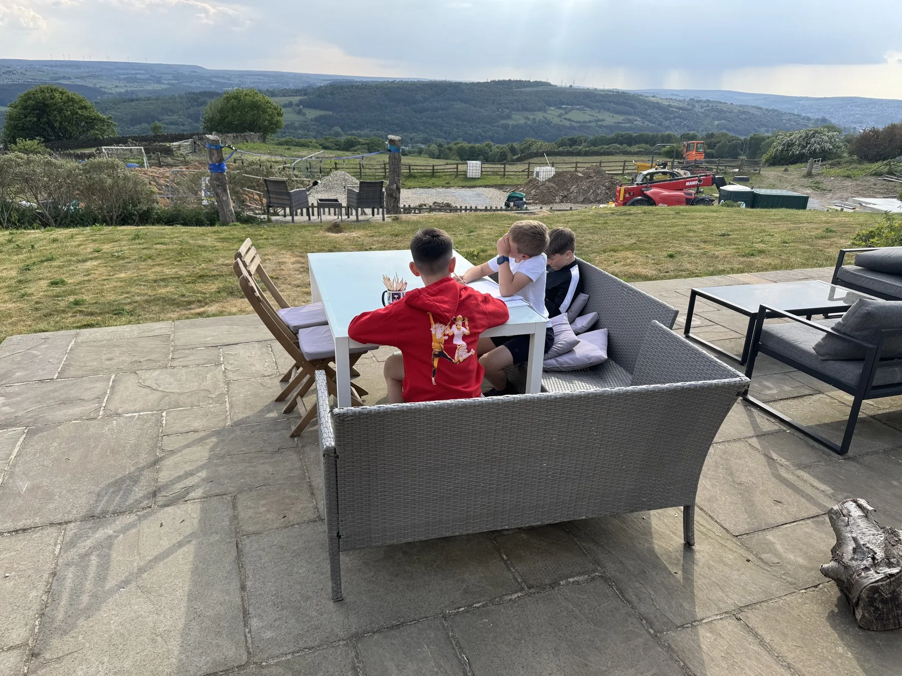Students learning outdoors overlooking the Bingley countryside